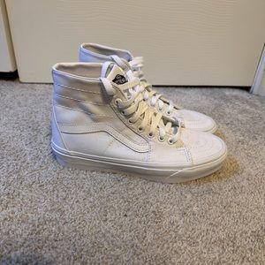White high top Vans. Size 7.5 in women’s. Only worn once.